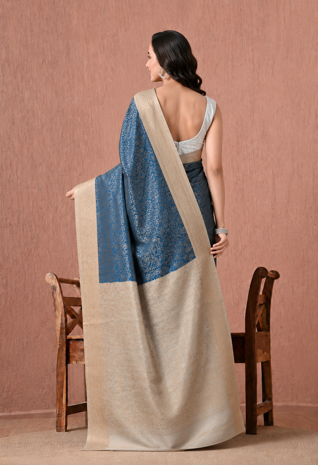 Teal Blue Art Silk Woven Saree with Gold-Tone Floral Motifs & Zari Border
