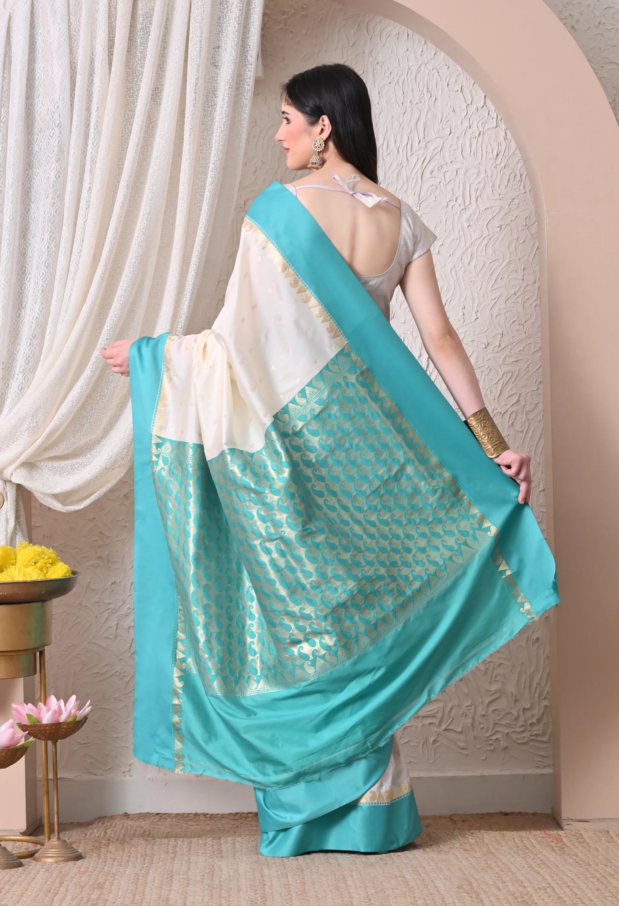 Enchanting Off-White and Turquoise Silk Blend Saree