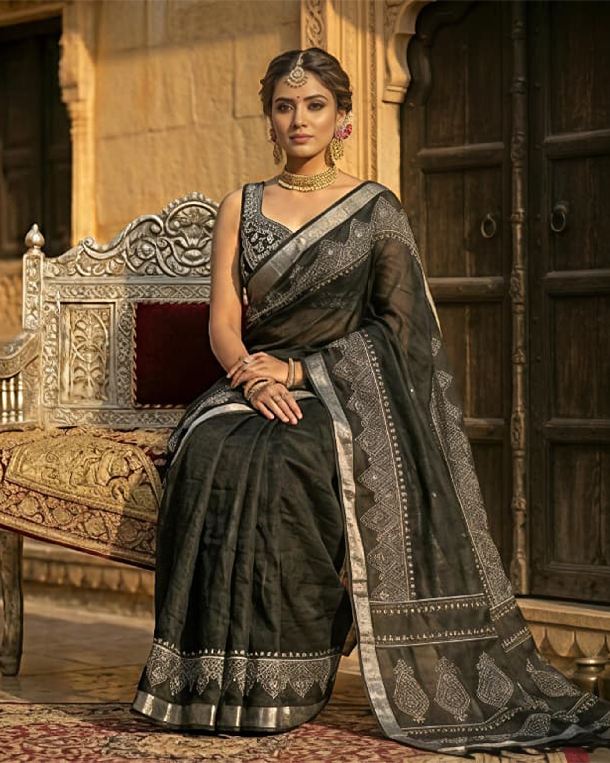Women Black & Silver-Toned Pure Cotton Woven Design Saree with Tassels