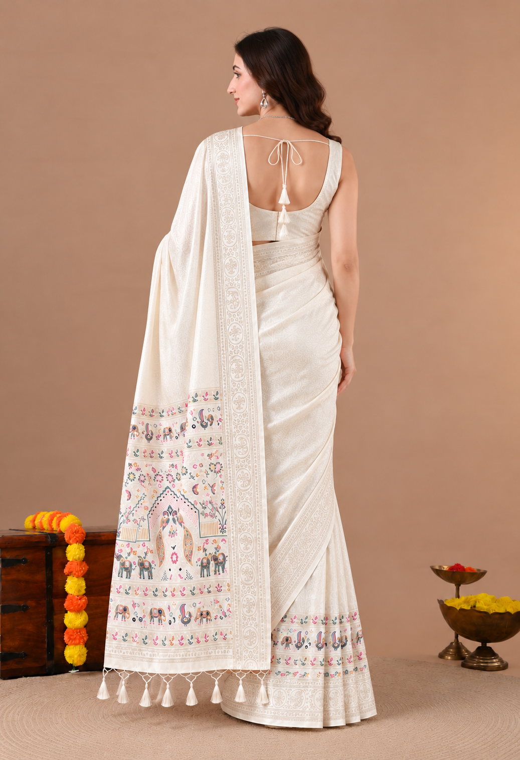 Elegant Ivory Silk Blend Saree with Printed Pallu and Tassel Detailing