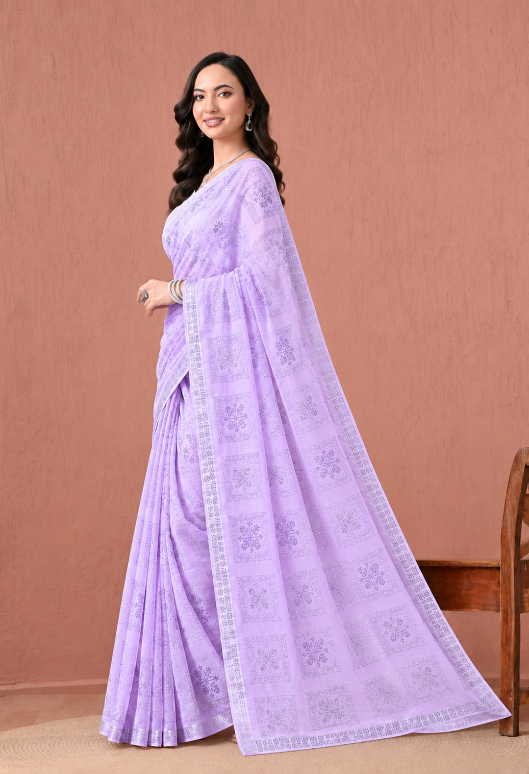 Elegant Lavender Georgette Saree with Intricate Woven Pattern and Matching Border