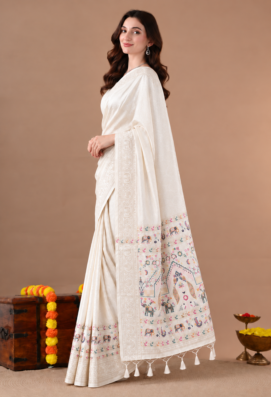 Elegant Ivory Silk Blend Saree with Printed Pallu and Tassel Detailing