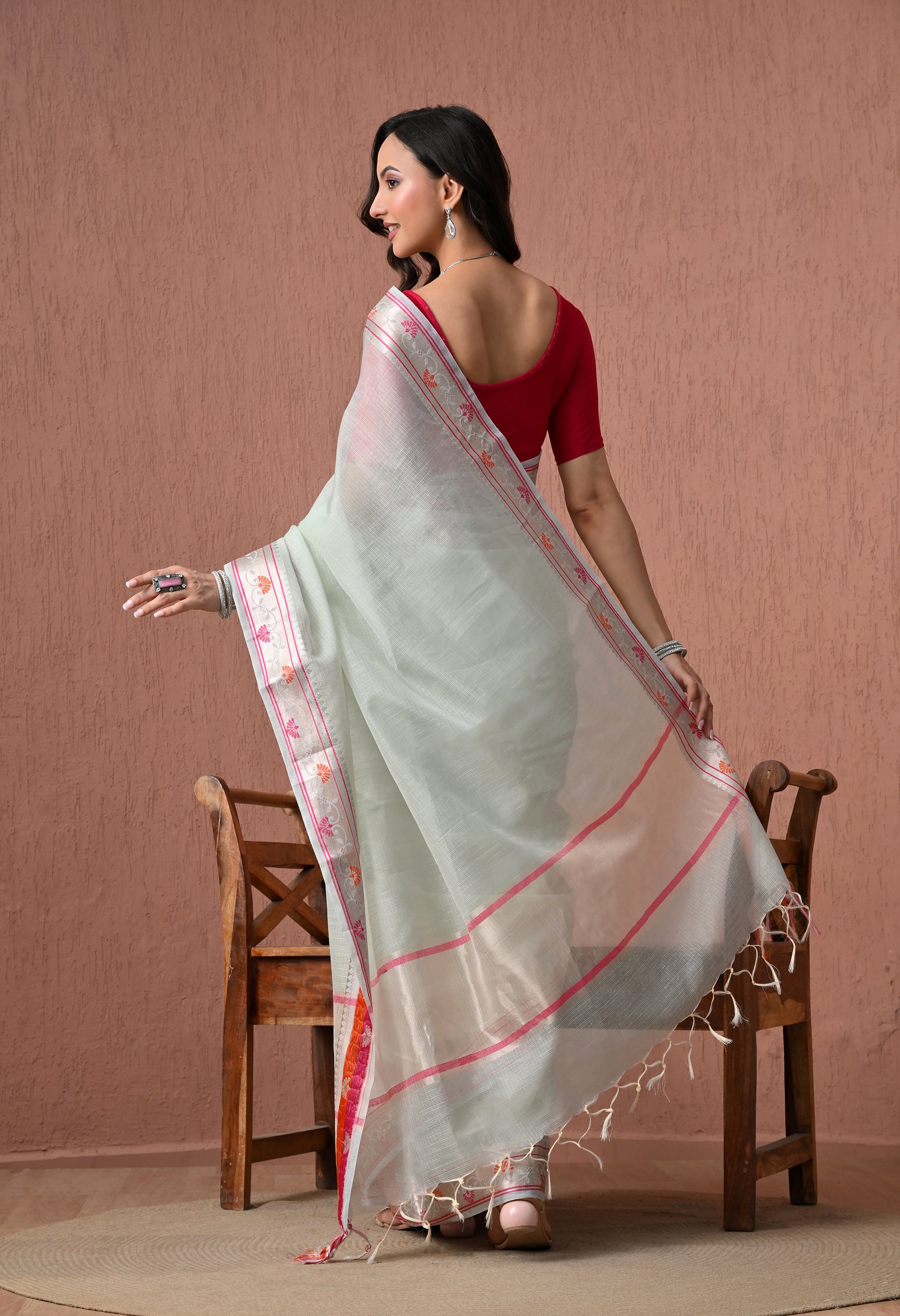 Pastel Mint Green Pure Cotton Saree with Festive Pink and Orange Border