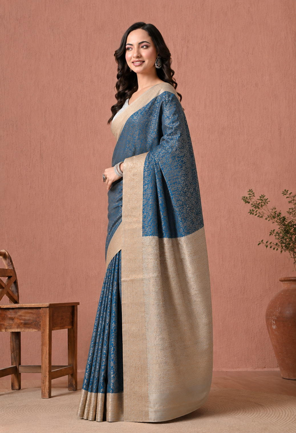 Teal Blue Art Silk Woven Saree with Gold-Tone Floral Motifs & Zari Border