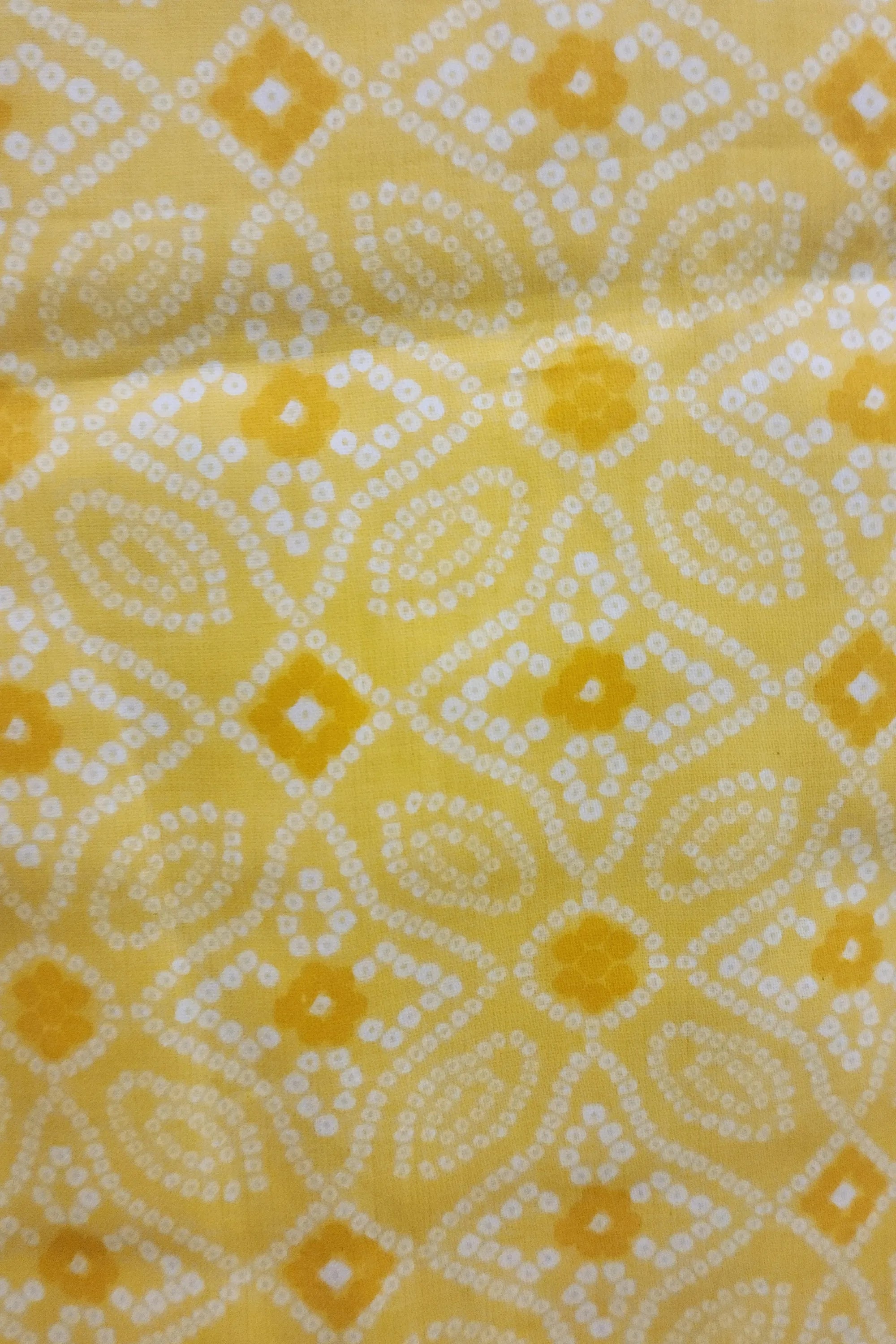 Yellow & White Bandhani Printed Pure Cotton Unstitched Dress Material with Embroidered Neckline