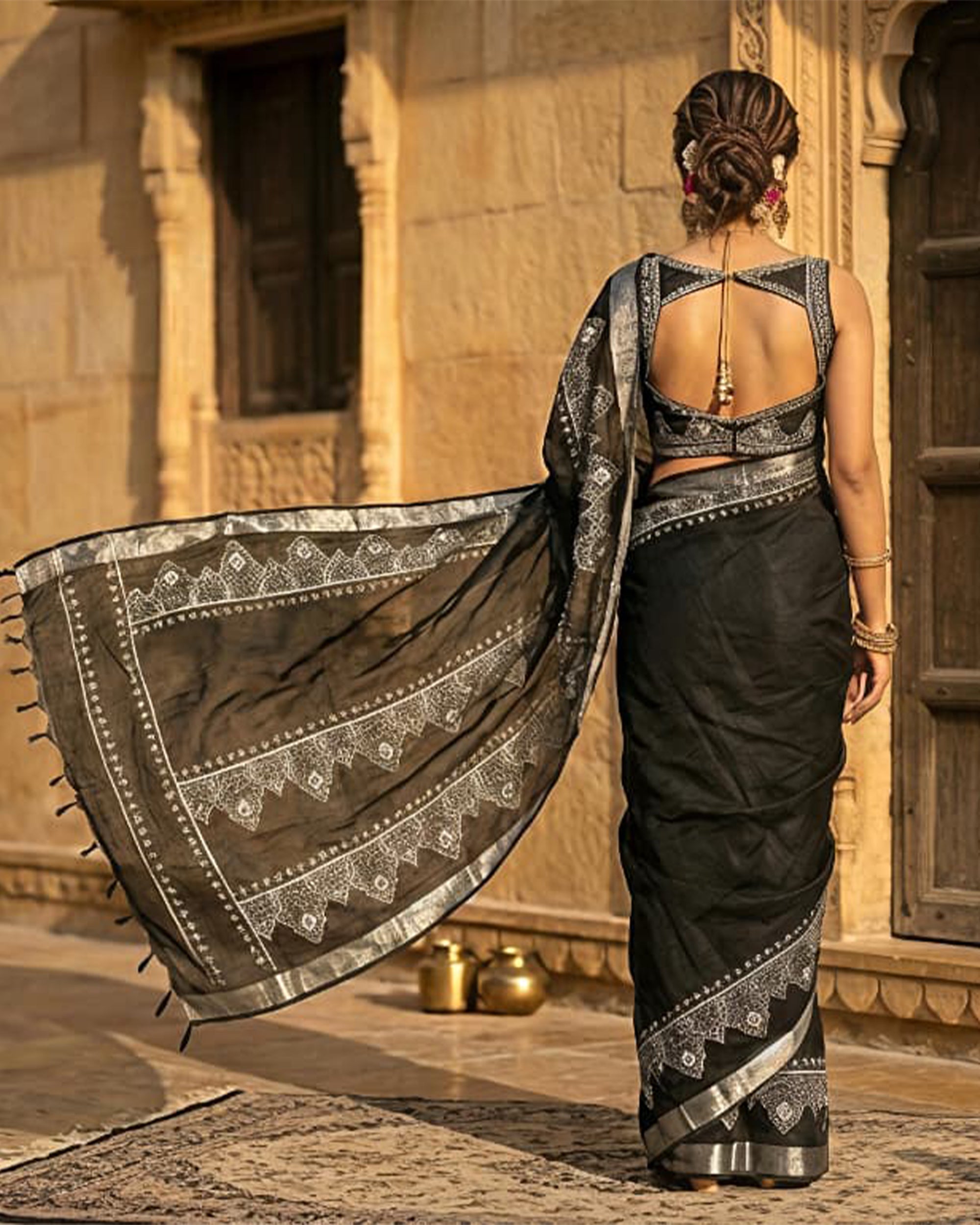 Women Black & Silver-Toned Pure Cotton Woven Design Saree with Tassels