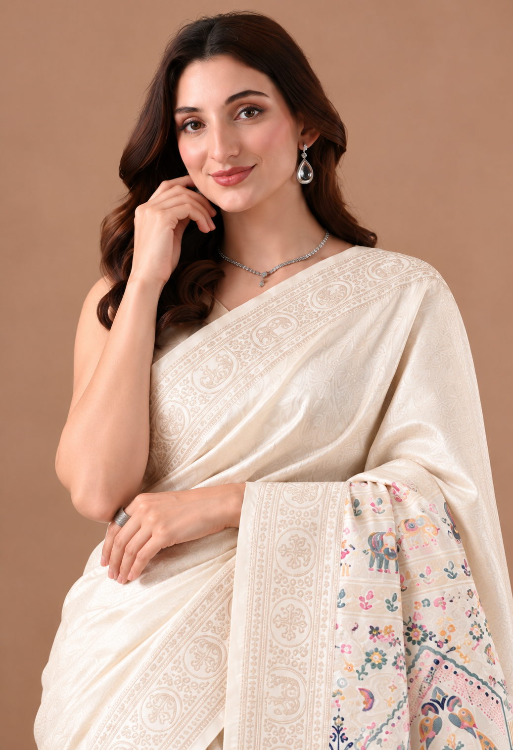 Elegant Ivory Silk Blend Saree with Printed Pallu and Tassel Detailing
