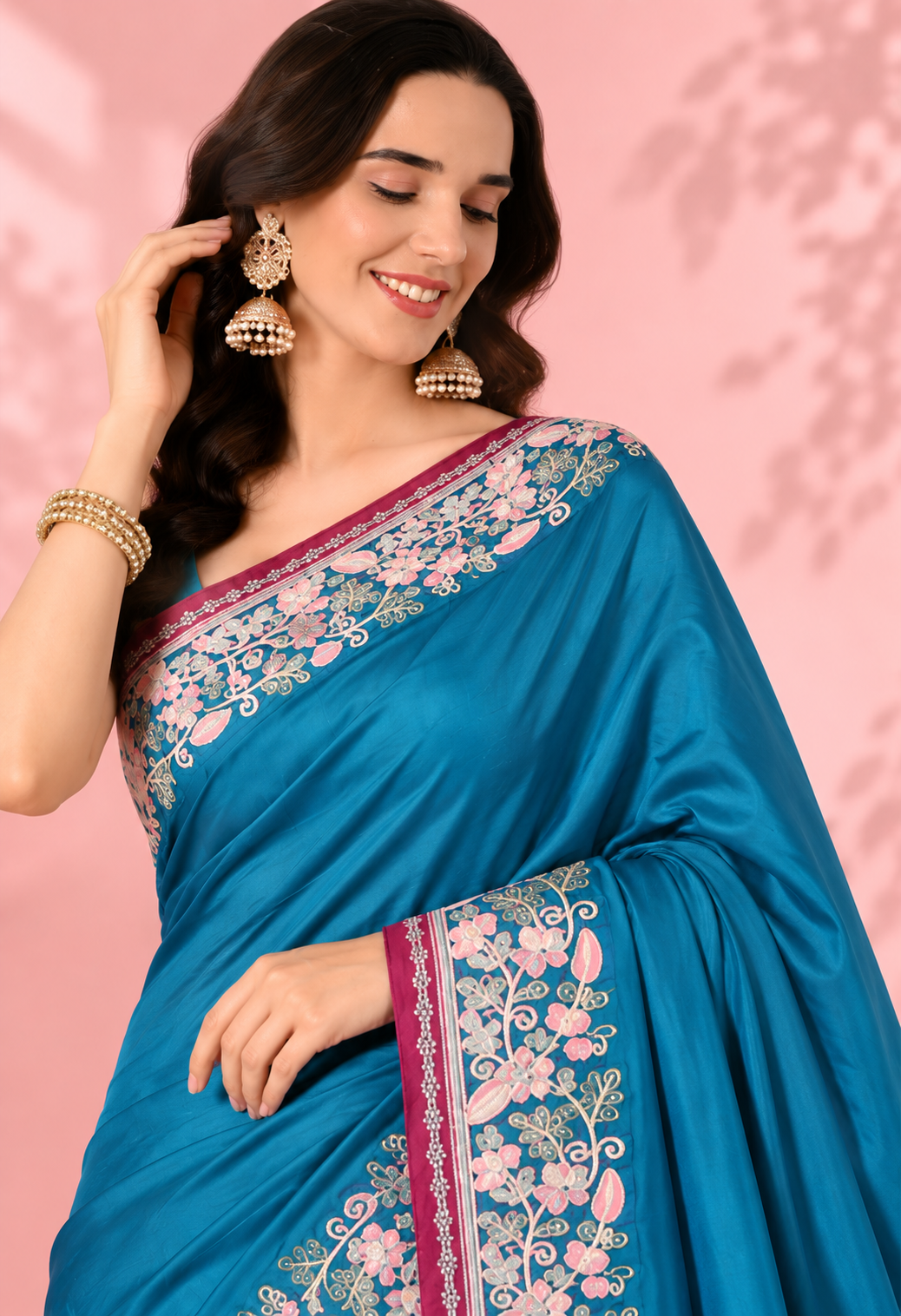 Elegant Teal Blue Floral Border Saree with Rich Pink Accents