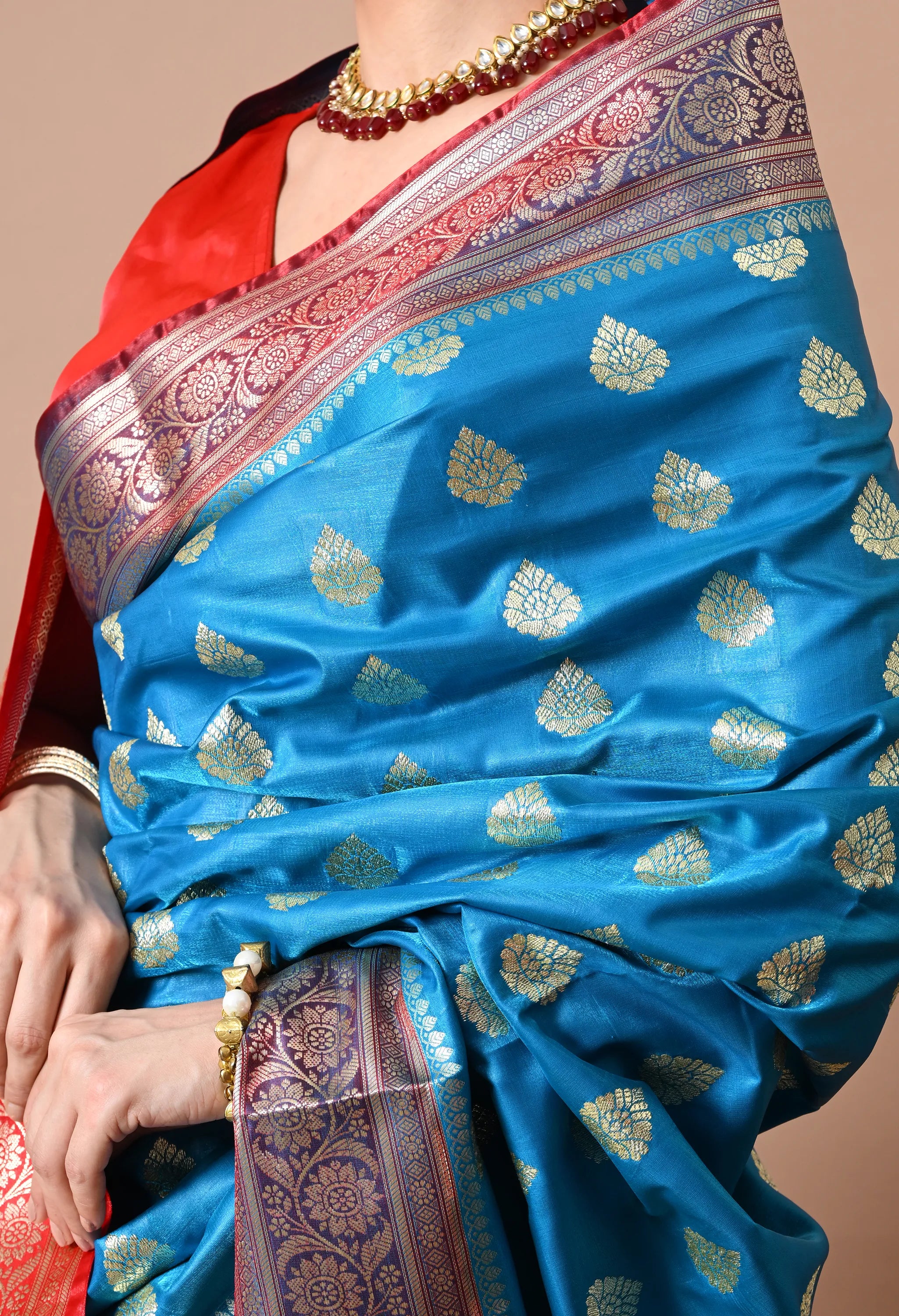 Ethnic Elegance: Teal Blue & Gold-Toned Silk Blend Banarasi Saree