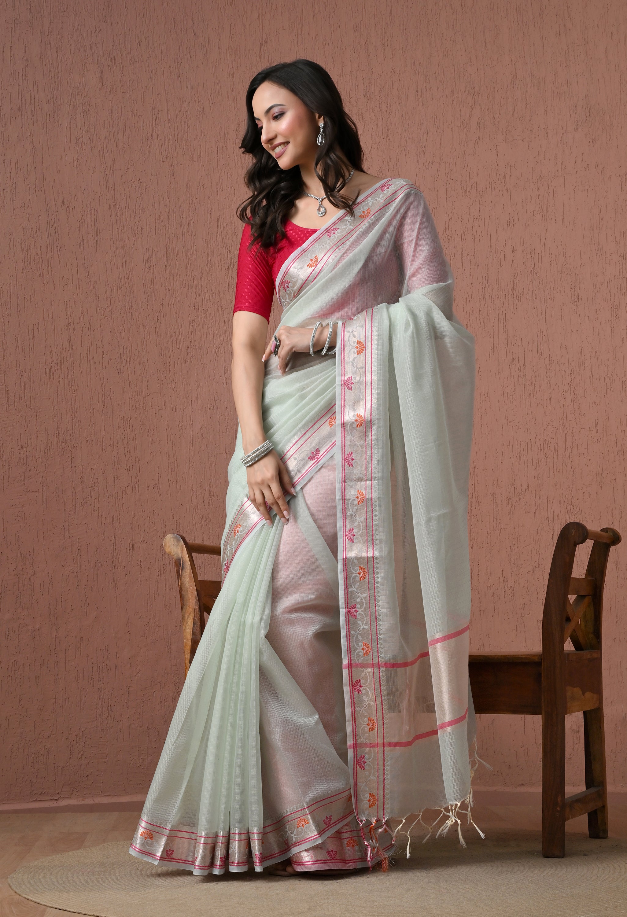 Pastel Mint Green Pure Cotton Saree with Festive Pink and Orange Border