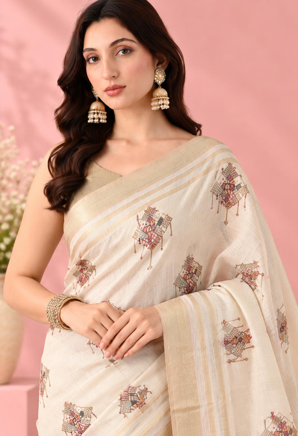Elegant Ivory Printed Saree with Floral Motifs, Gold Border & Tassel Pallu