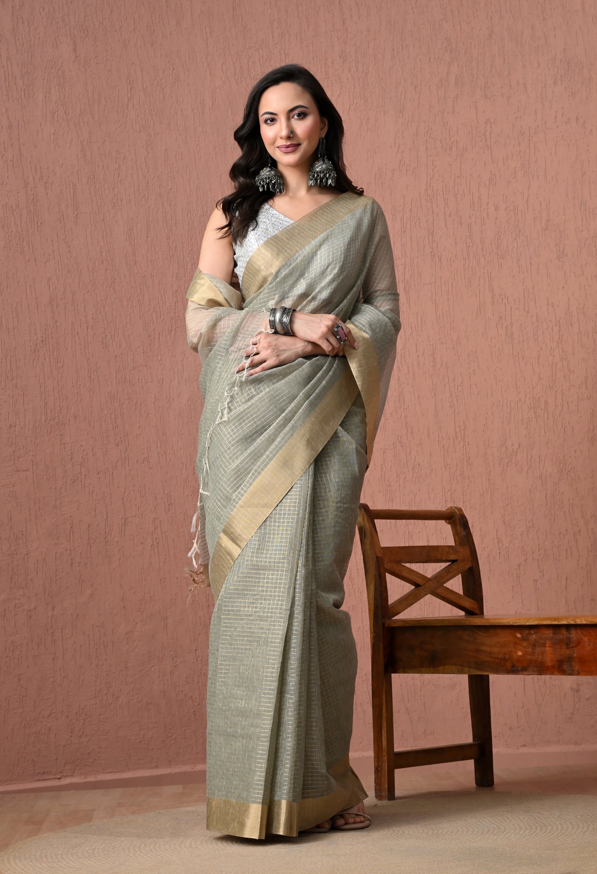 Sage Green Pure Cotton  Saree with Golden Zari Border.