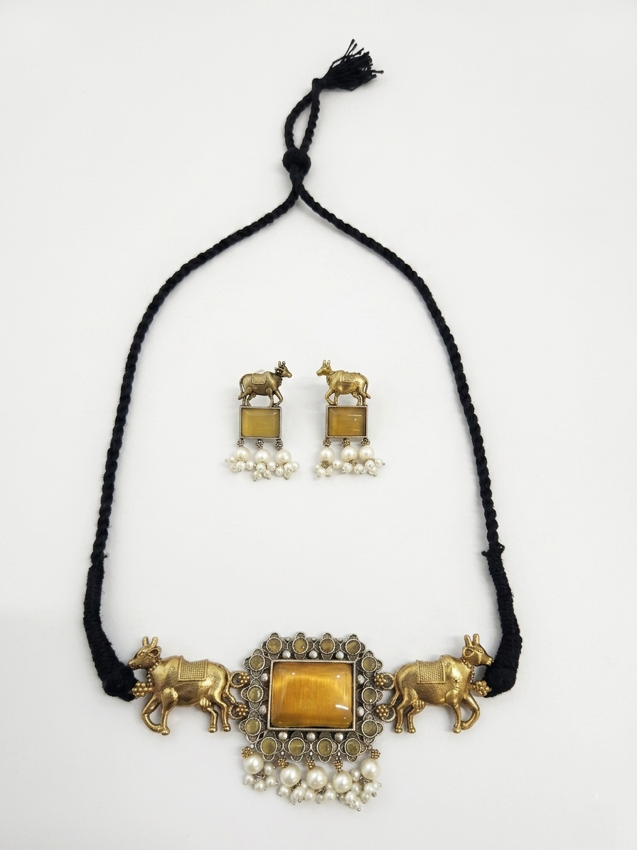Gold-Toned & Silver-Plated Handcrafted Temple Jewellery Set with Cow Motifs and Ochre Stones