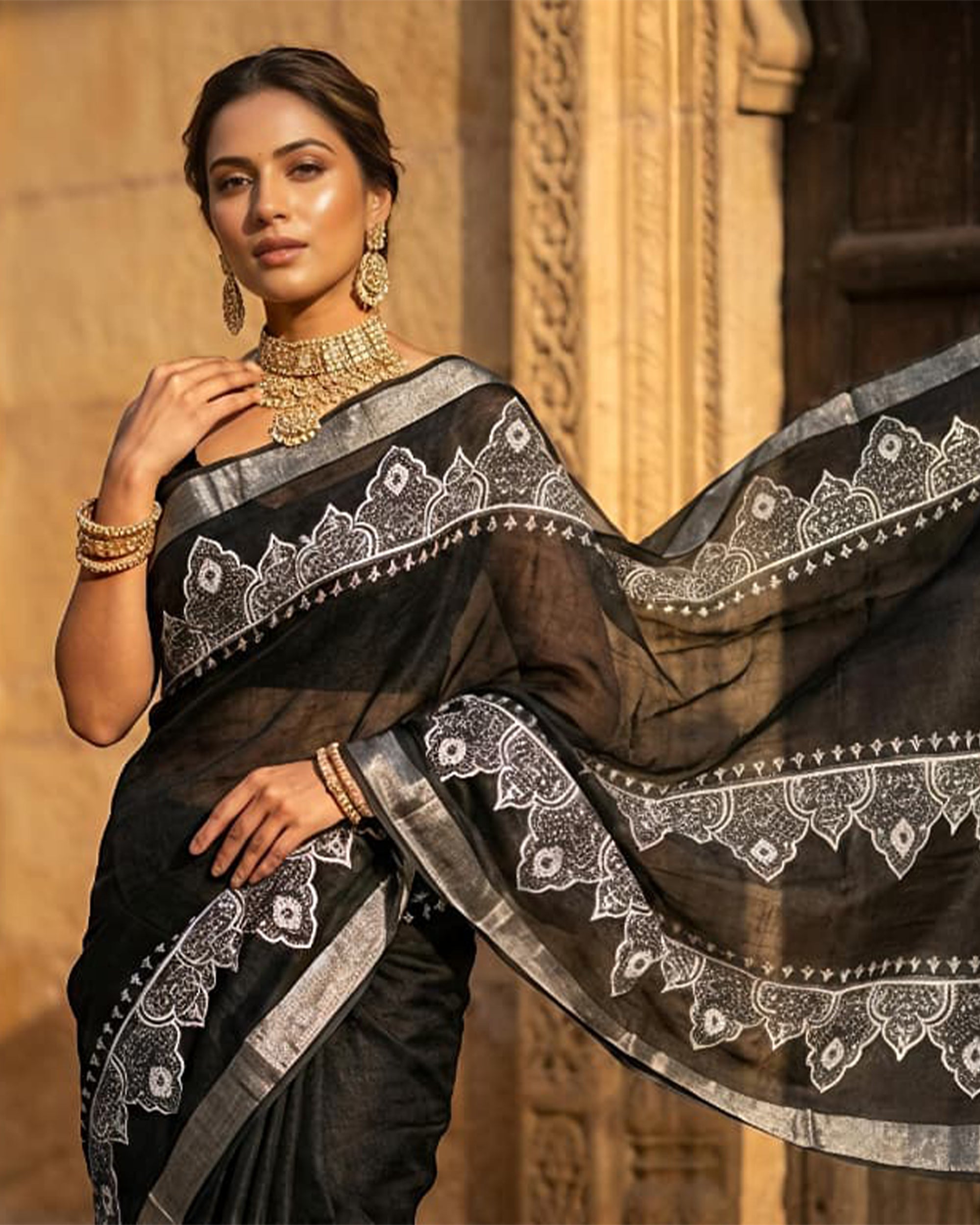 Women Black & Silver-Toned Pure Cotton Woven Design Saree with Tassels
