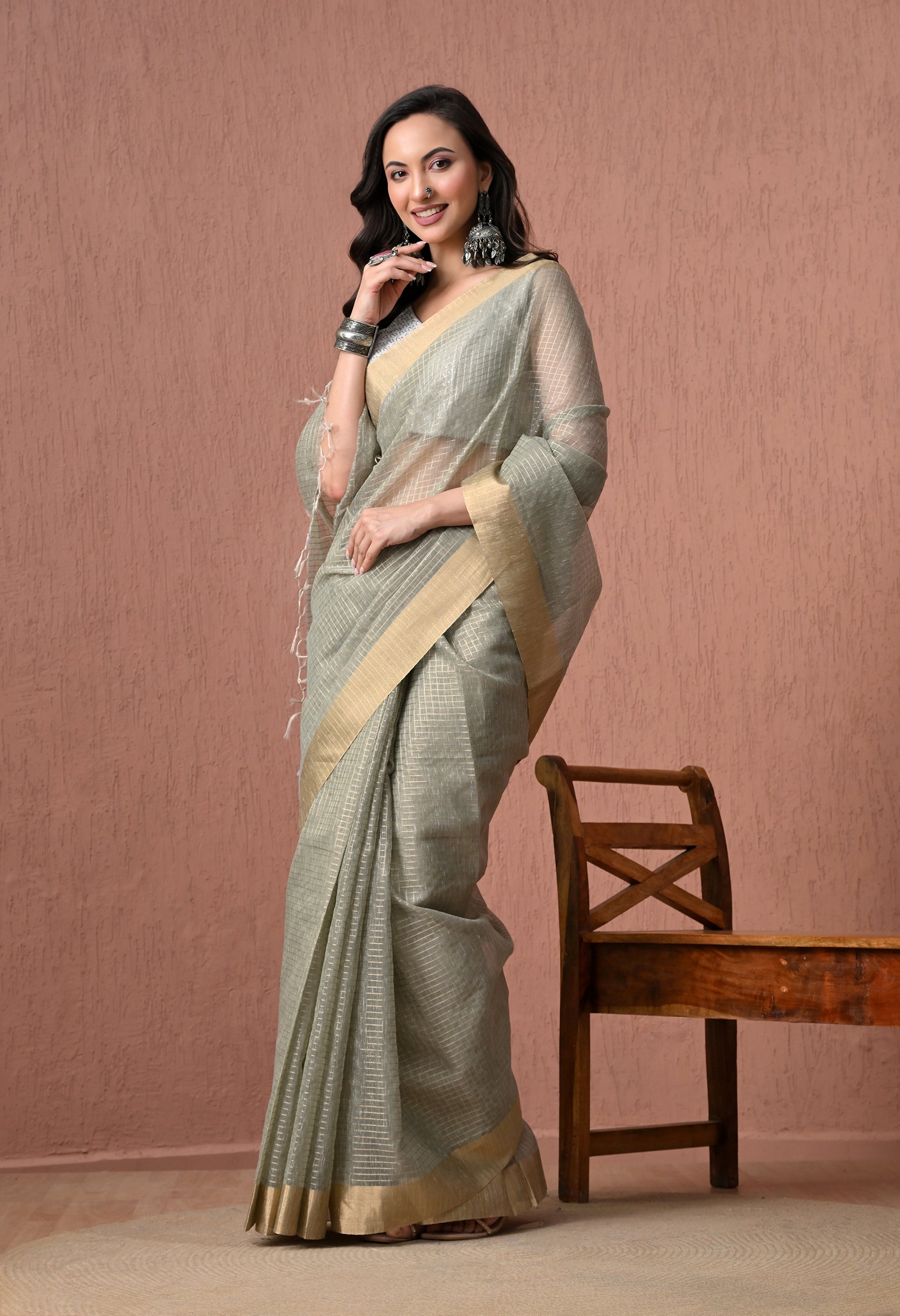 Sage Green Pure Cotton  Saree with Golden Zari Border.