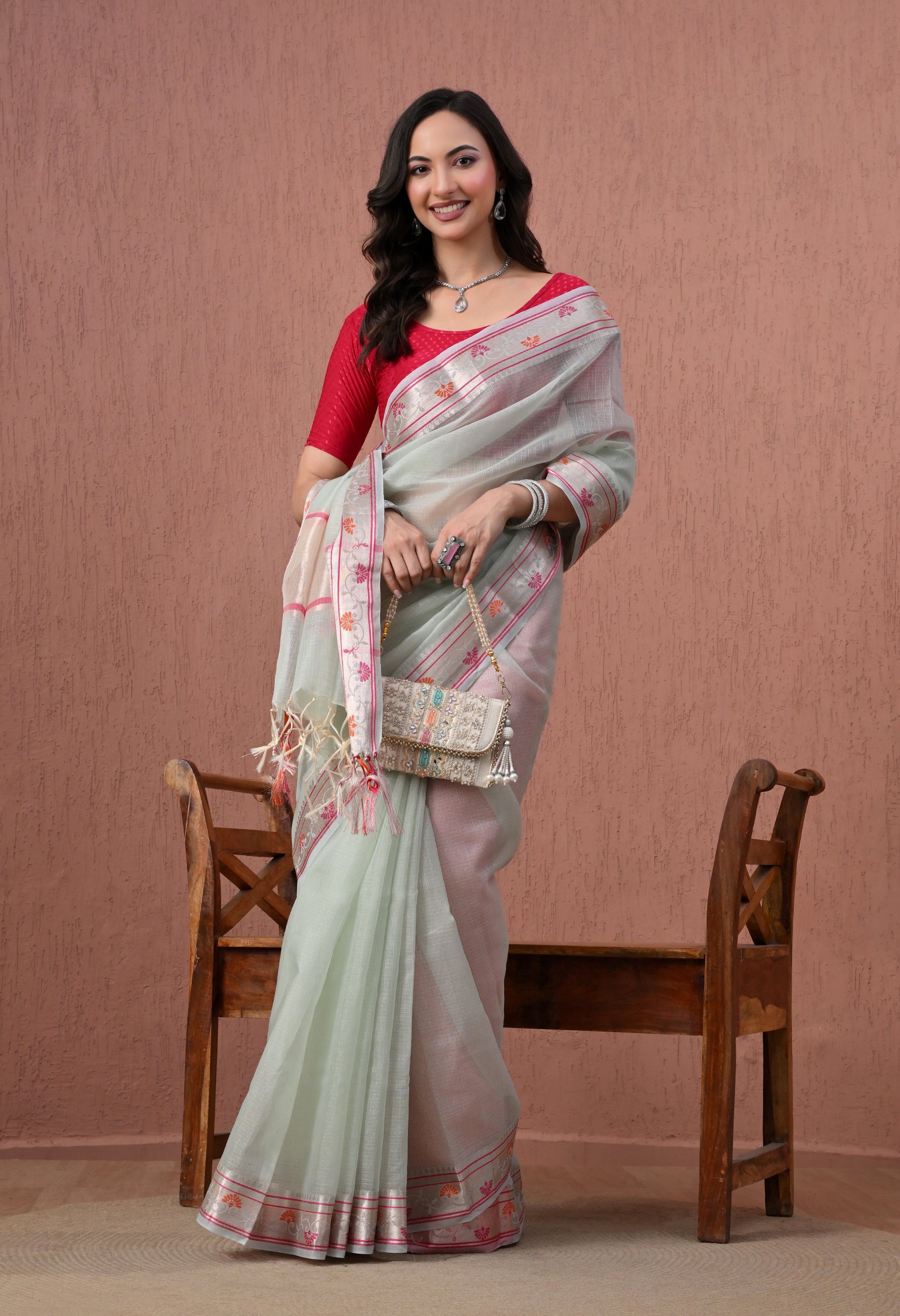 Pastel Mint Green Pure Cotton Saree with Festive Pink and Orange Border