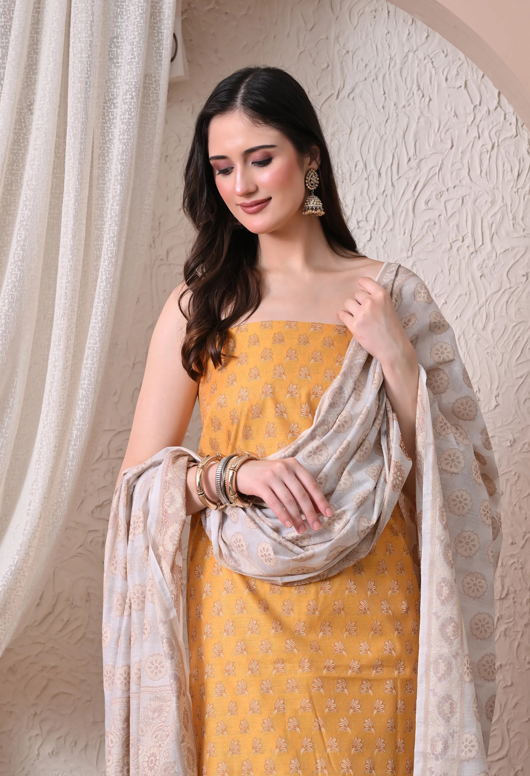Elegant Mustard Yellow and Off-White Woven Silk Unstitched Salwar Suit Material with Banarasi Style Dupatta