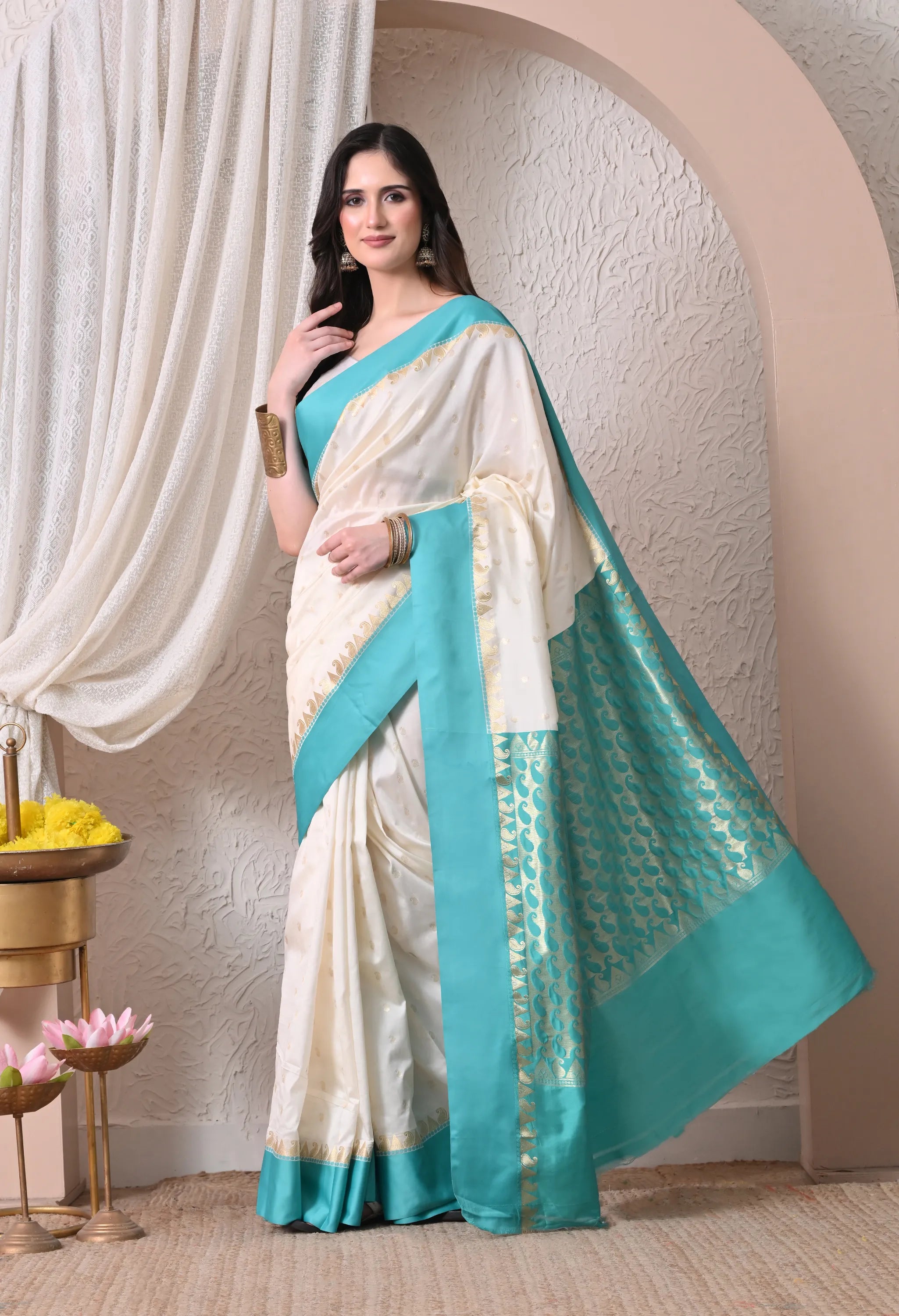 Enchanting Off-White and Turquoise Silk Blend Saree