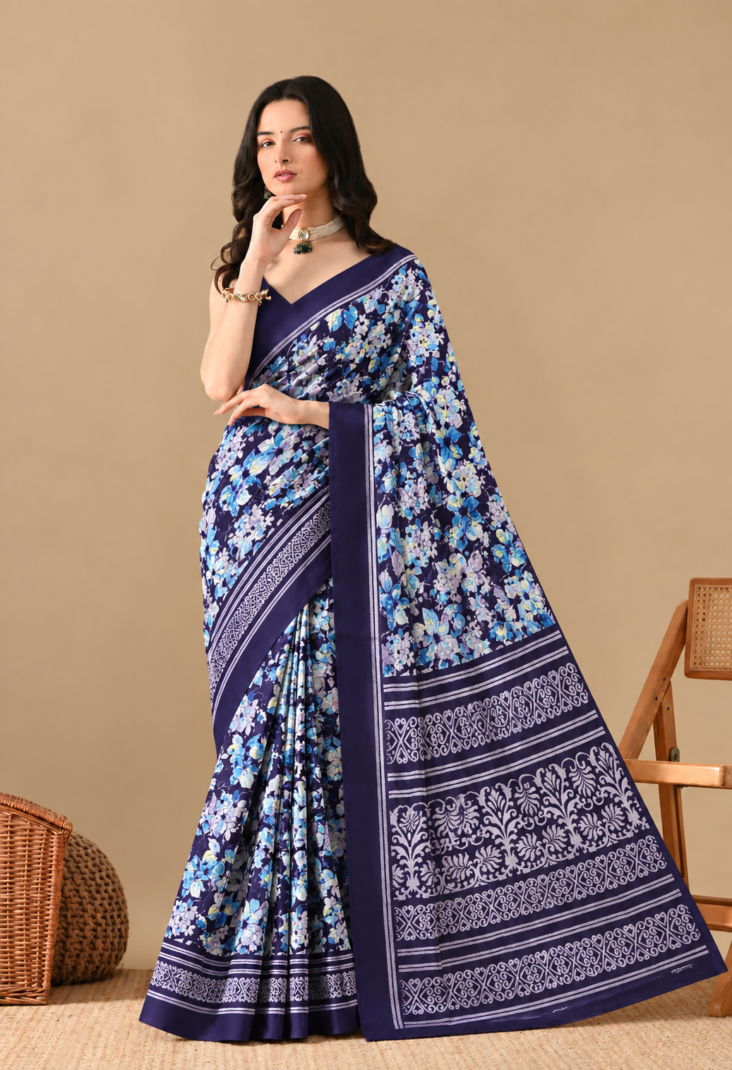 Pair this saree with a matching navy blouse, statement earrings, and traditional jewellery for a graceful and sophisticated ethnic look.
