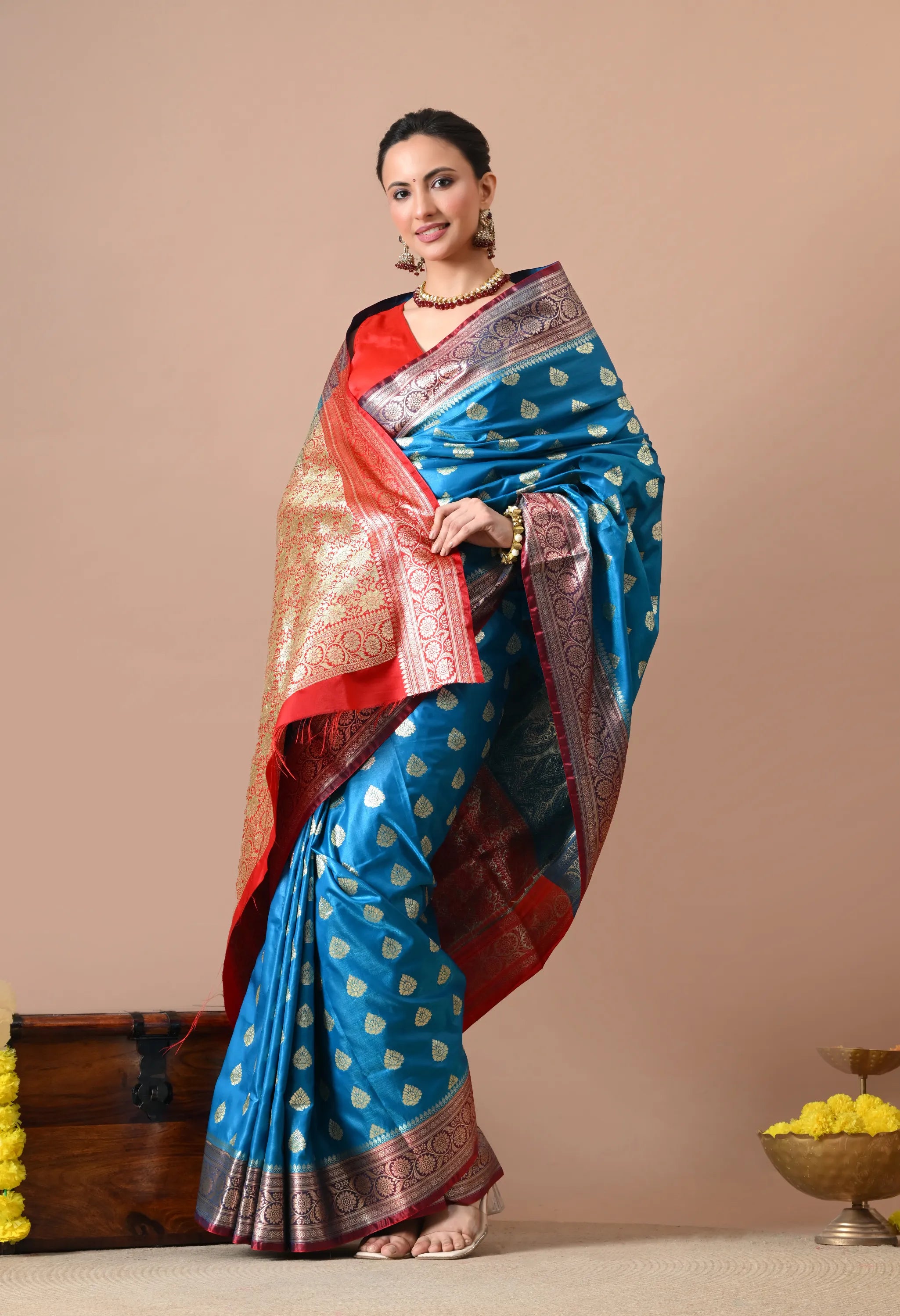 Ethnic Elegance: Teal Blue & Gold-Toned Silk Blend Banarasi Saree