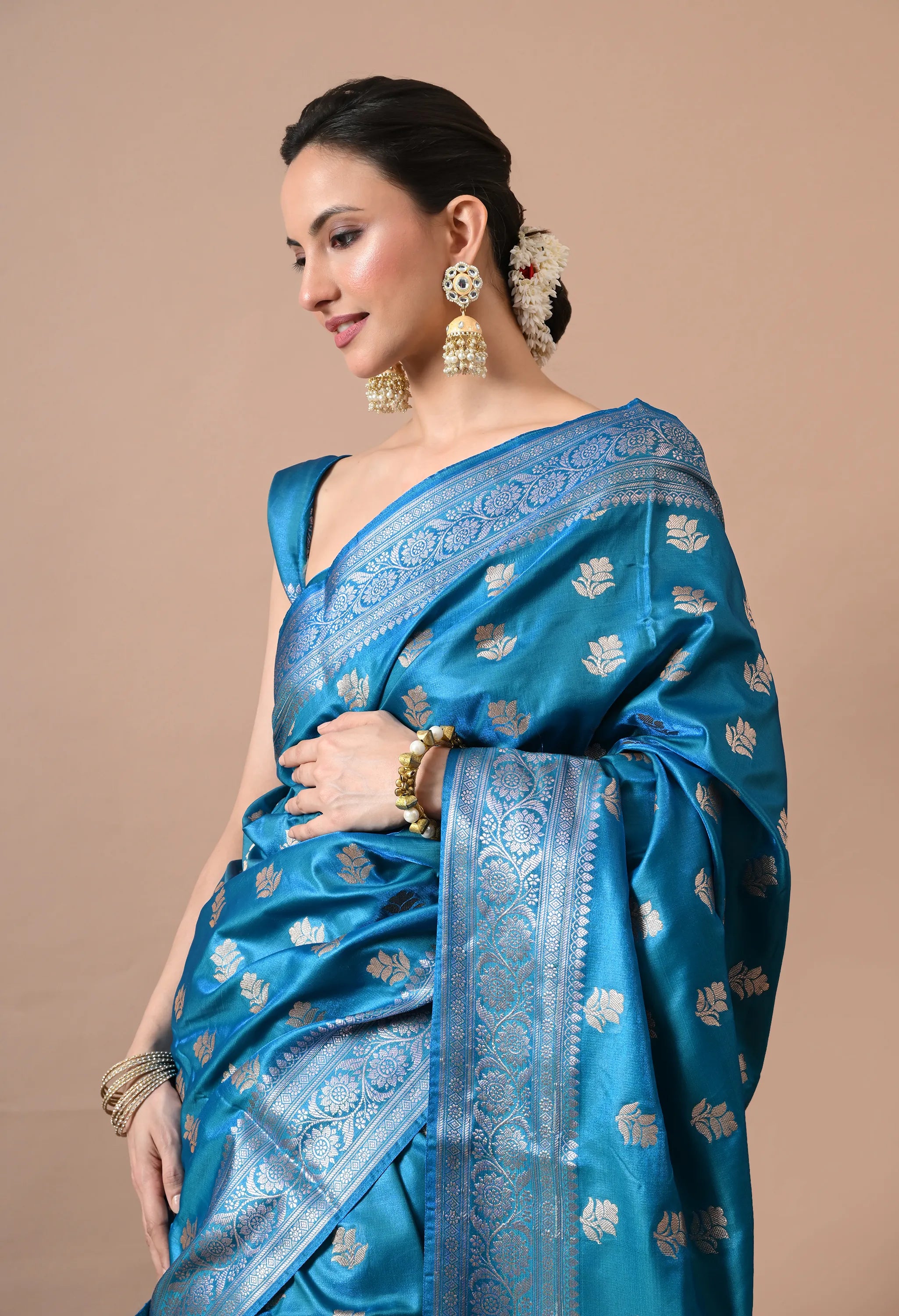 Ethnic Elegance Teal Blue & Silver-Toned Silk Blend Woven Design Banarasi Saree