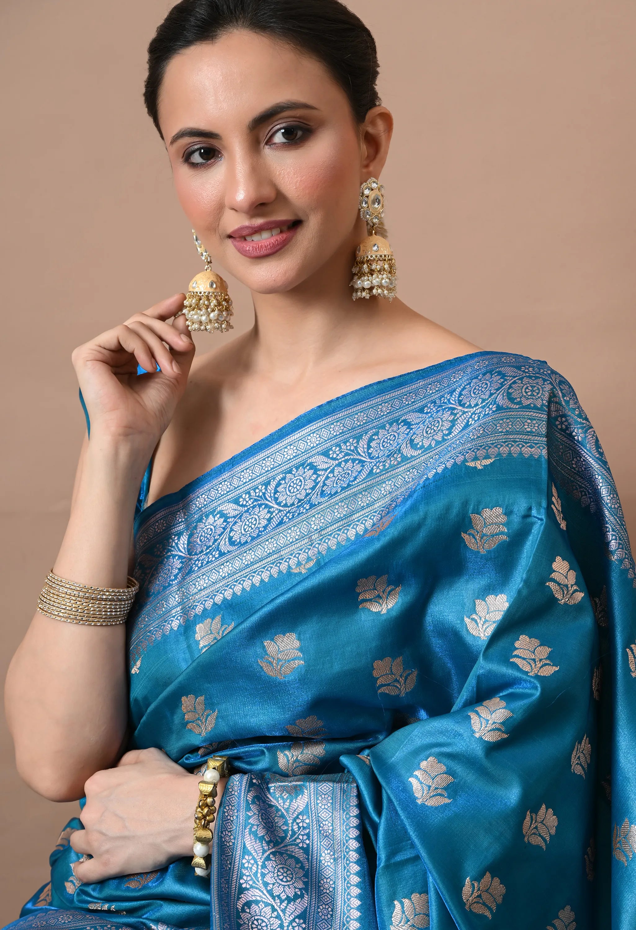 Ethnic Elegance Teal Blue & Silver-Toned Silk Blend Woven Design Banarasi Saree