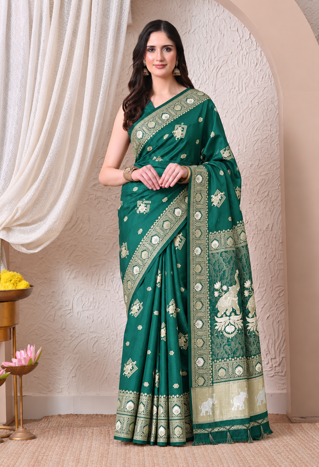 Pair this elegant saree with statement earrings, a classic blouse, and embellished heels for a graceful and sophisticated ethnic look.