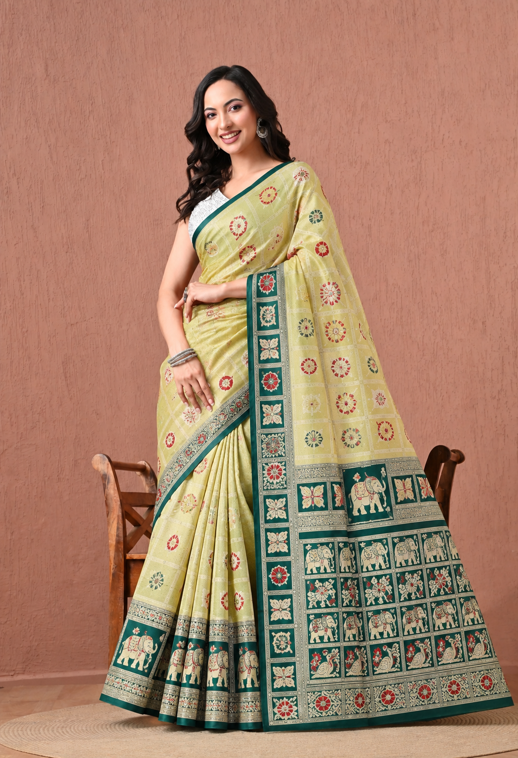 Pair it with a teal blouse, traditional gold jewellery and embellished heels for a graceful festive look.
