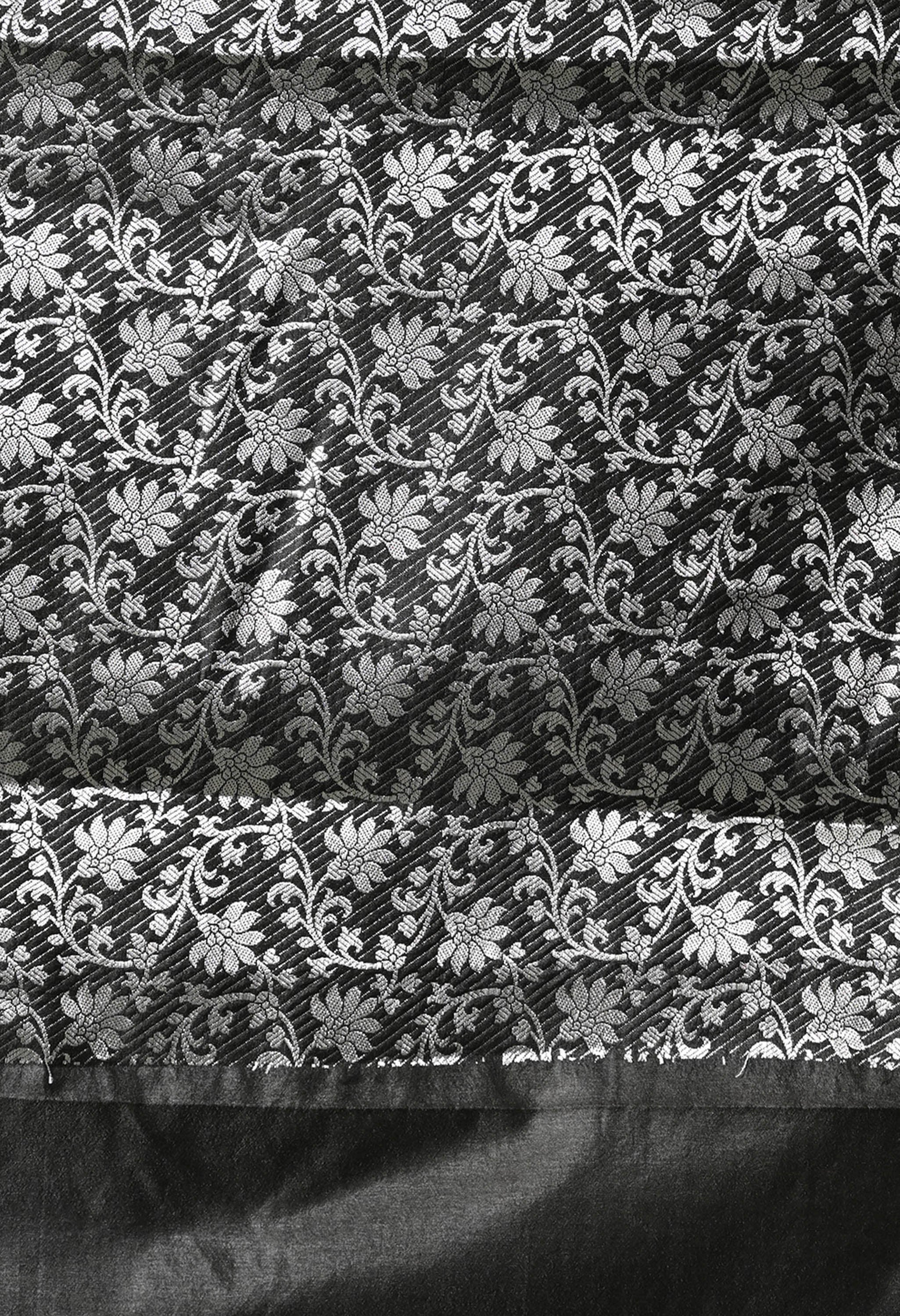 80 cm blouse piece showing an intricate silver zari work on black base