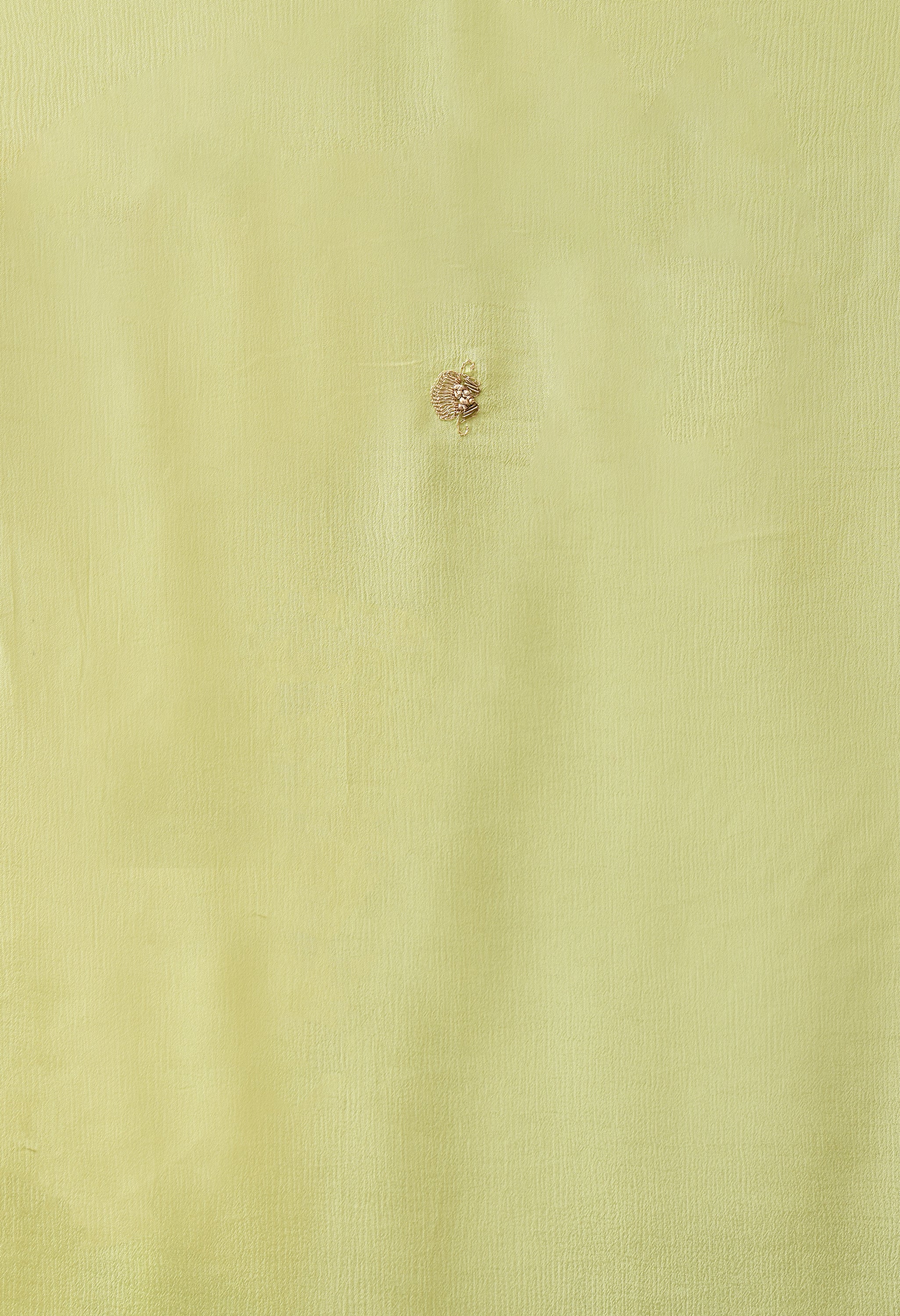 A close-up of 80 cm chiffon blouse piece in pista-green, of the saree from The Weavers Shop by Raavi 