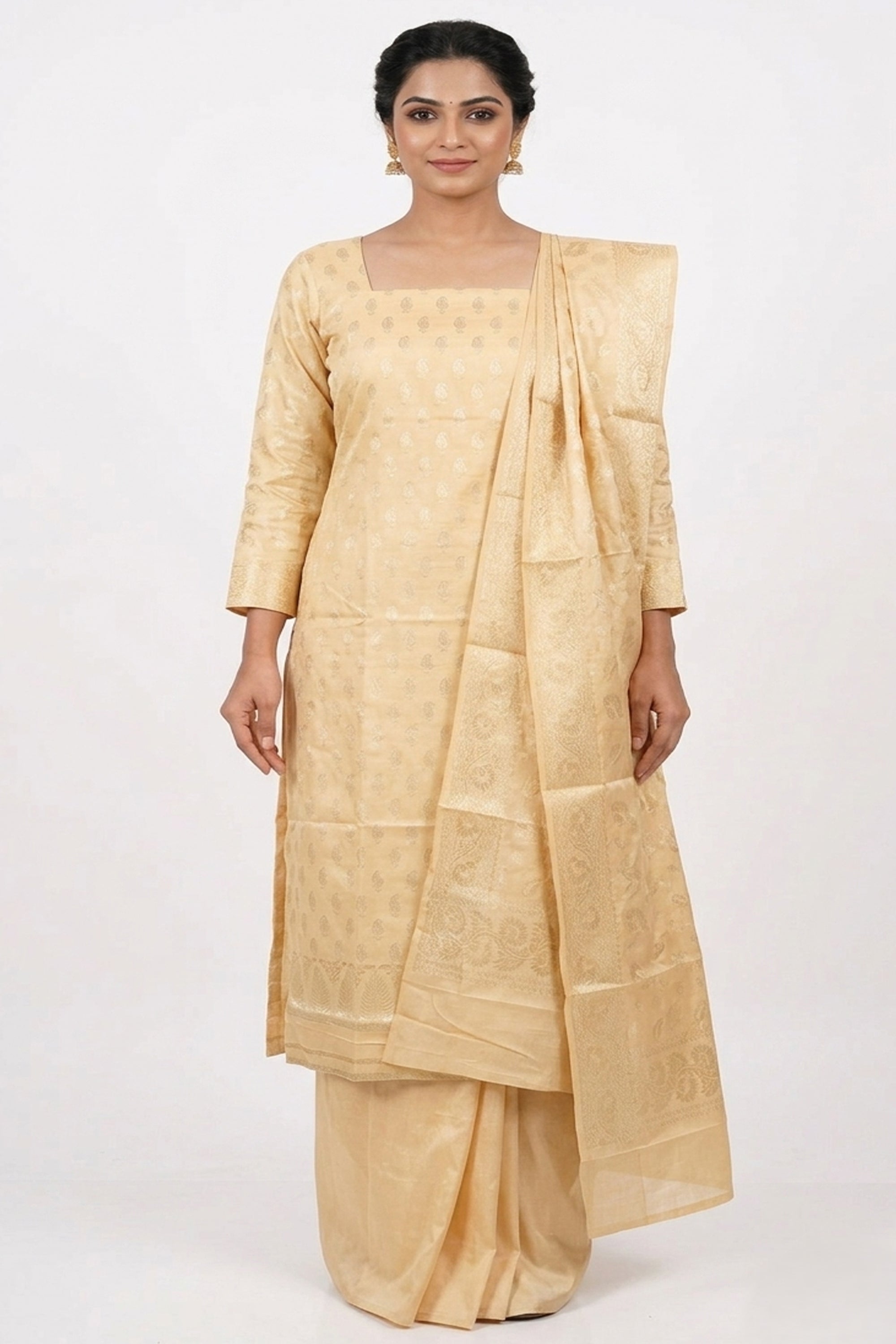 Cream and gold jacquard woven silk blend unstitched suit material with a matching heavy dupatta on a mannequin.