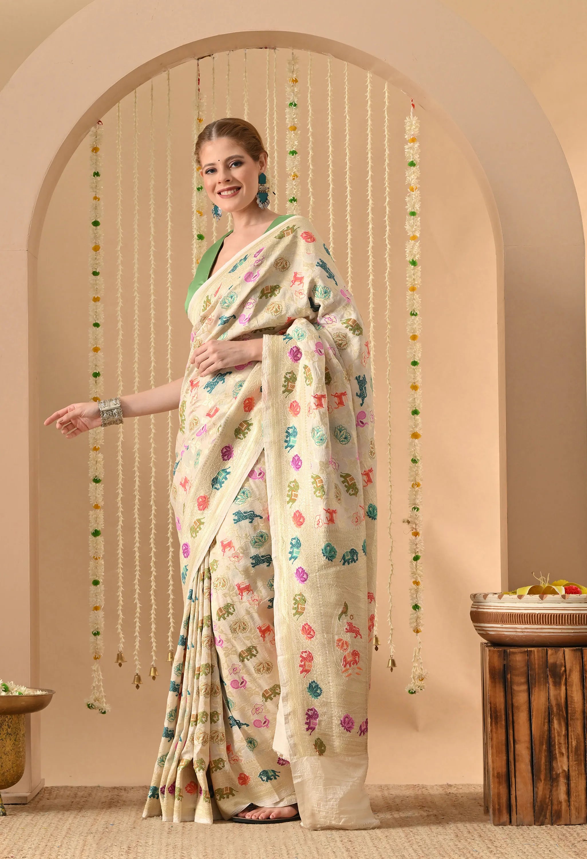 party wear Muga silk saree with Shikargah design