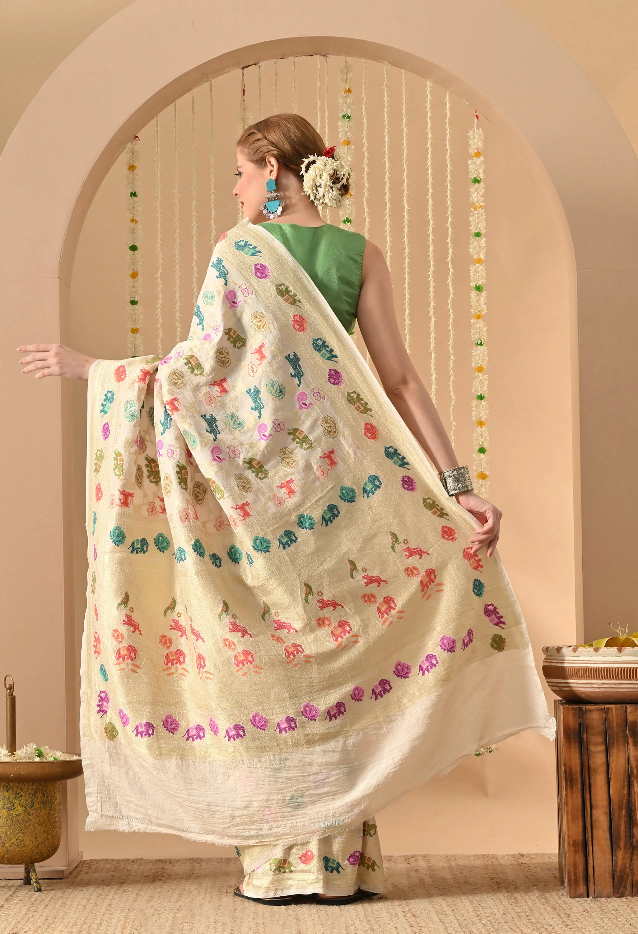 party wear Muga silk saree with Shikargah design