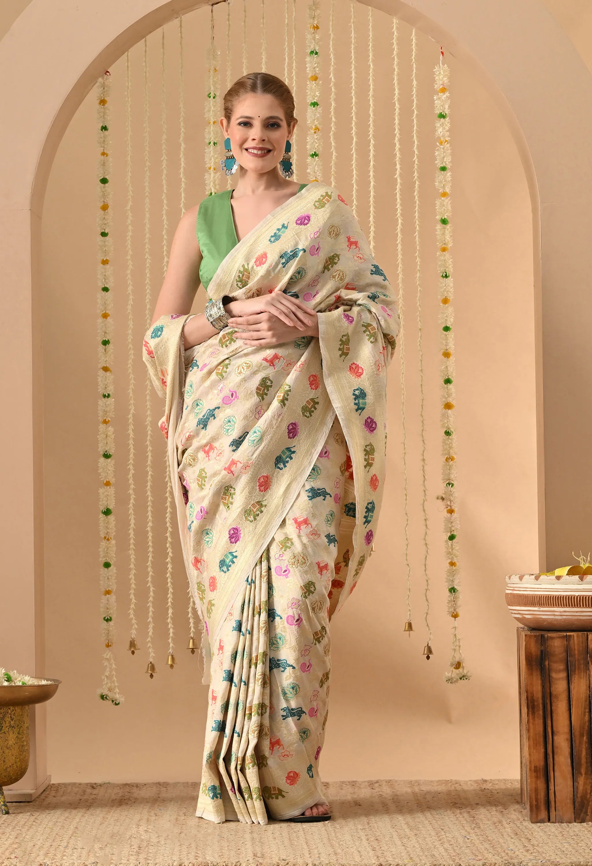 party wear Muga silk saree with Shikargah design