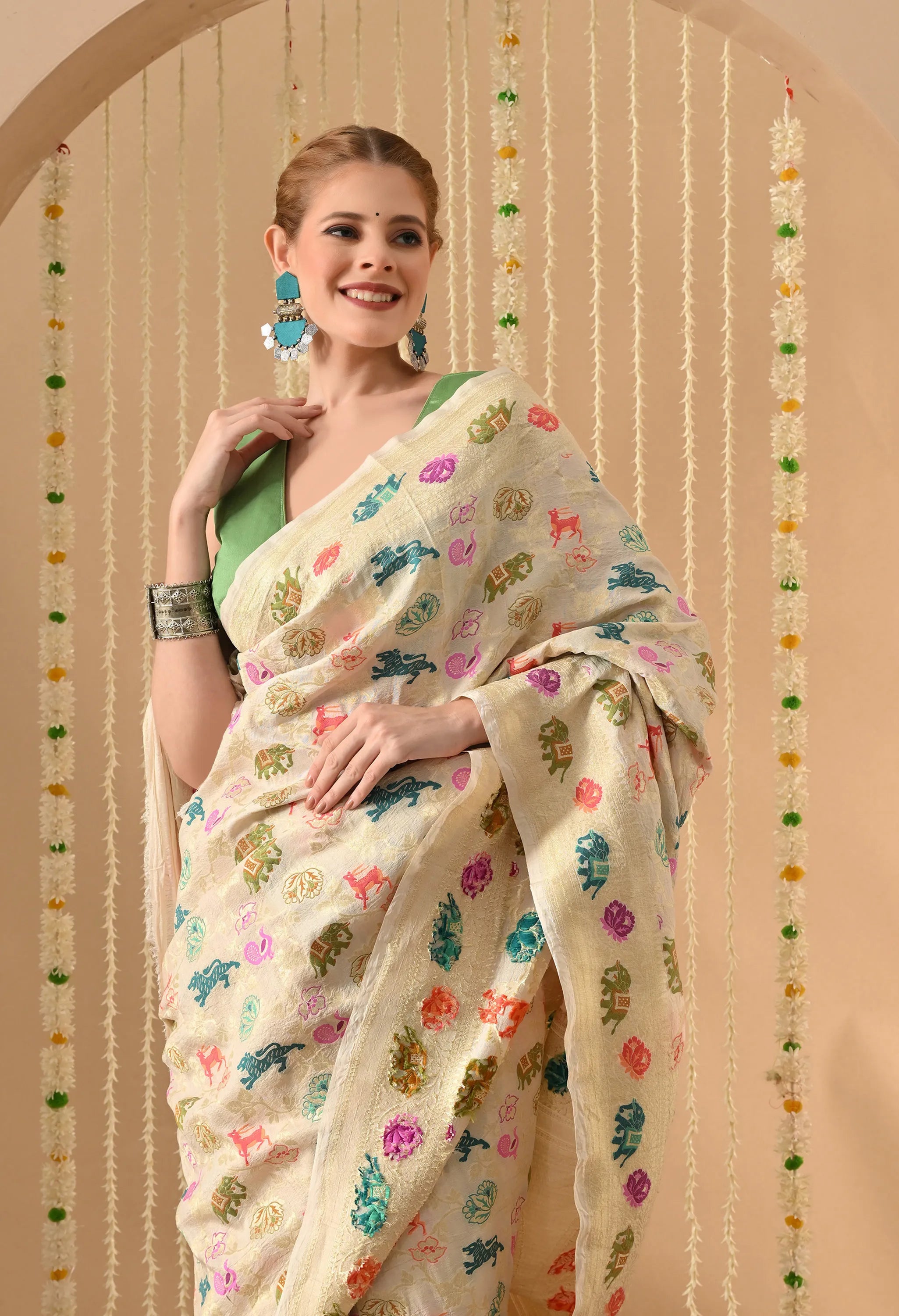 party wear Muga silk saree with Shikargah design