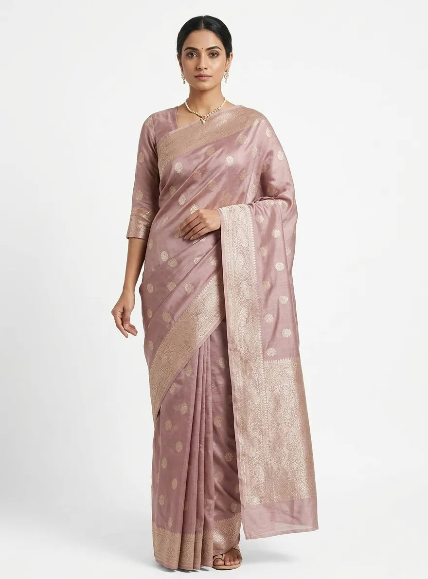 Mauve and rose gold woven design art silk saree with unstitched blouse piece.
