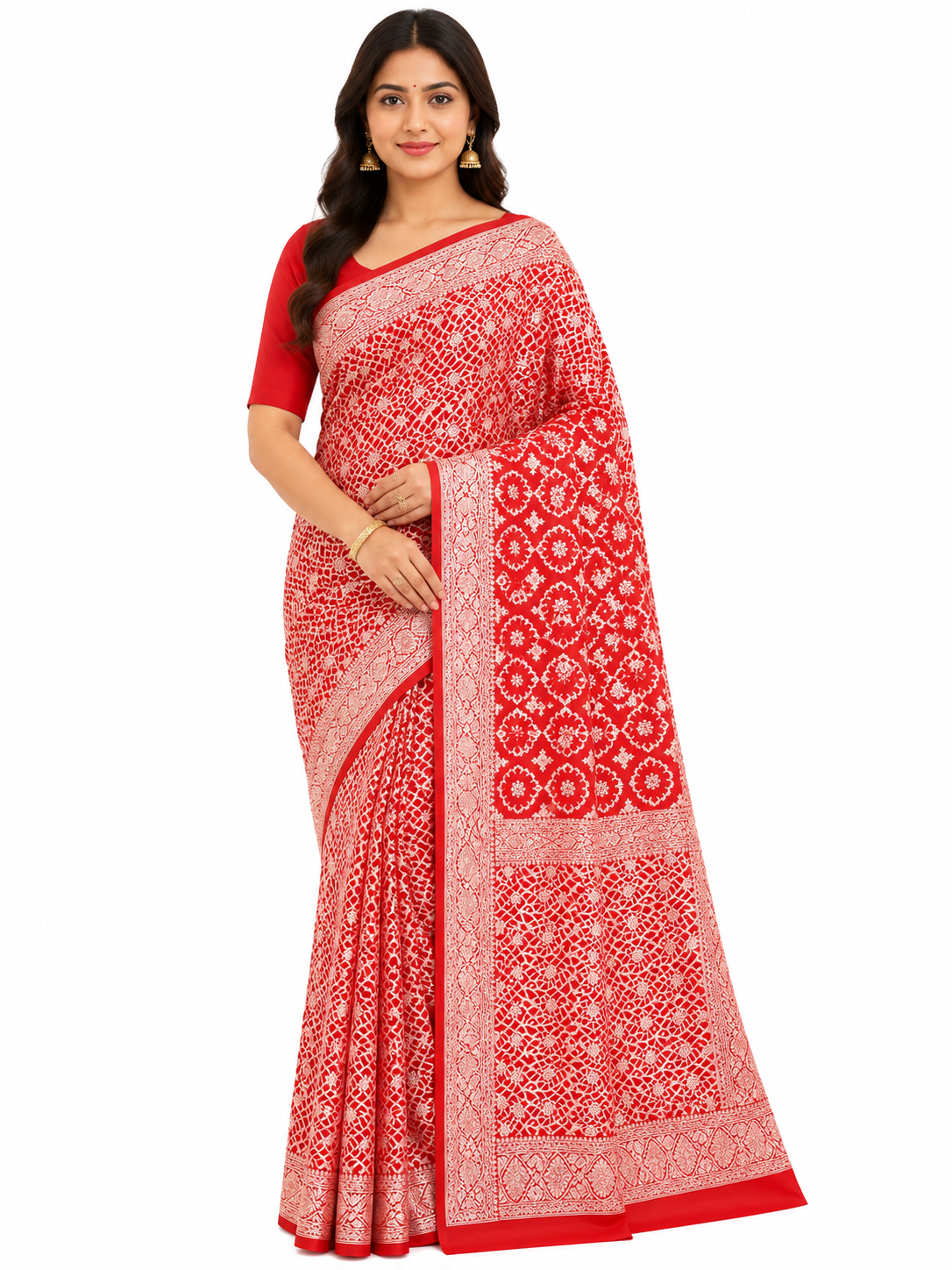 A woman posing in a rich red Banarasi saree featuring gold-toned circular woven motifs (Butis) spread across the body and a broad, ornate zari border.