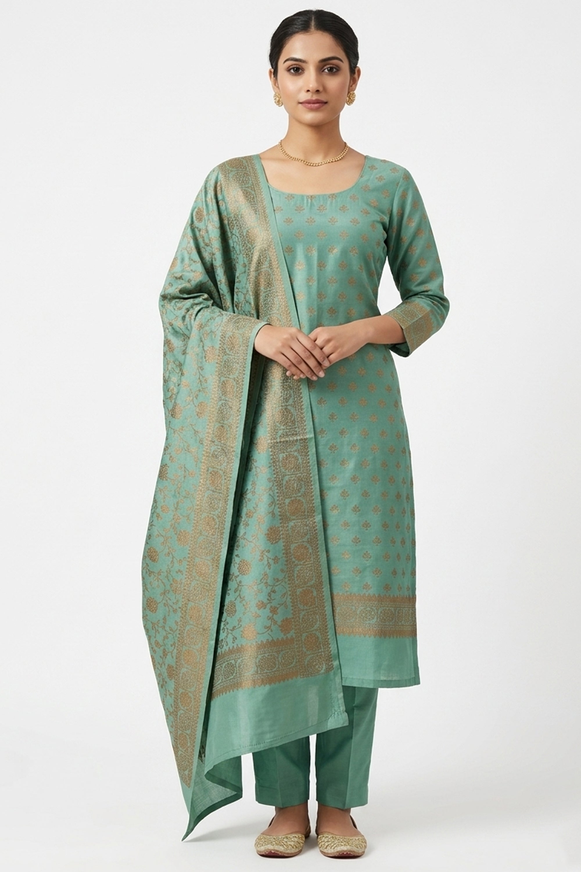 Sea green and copper silk blend unstitched suit material with ethnic motifs and a heavy woven dupatta.
