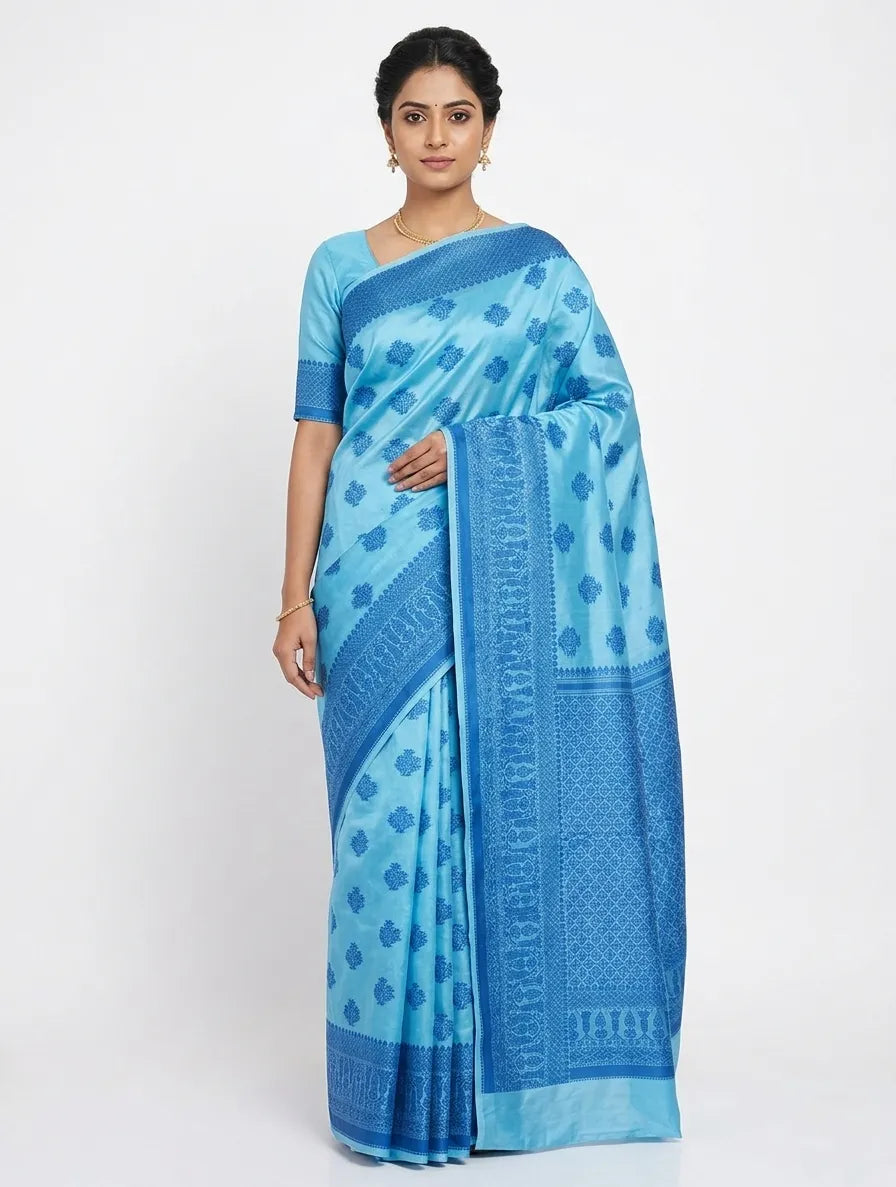 Woman wearing a sky blue Banarasi art silk saree with royal blue woven floral motifs and a traditional border.
