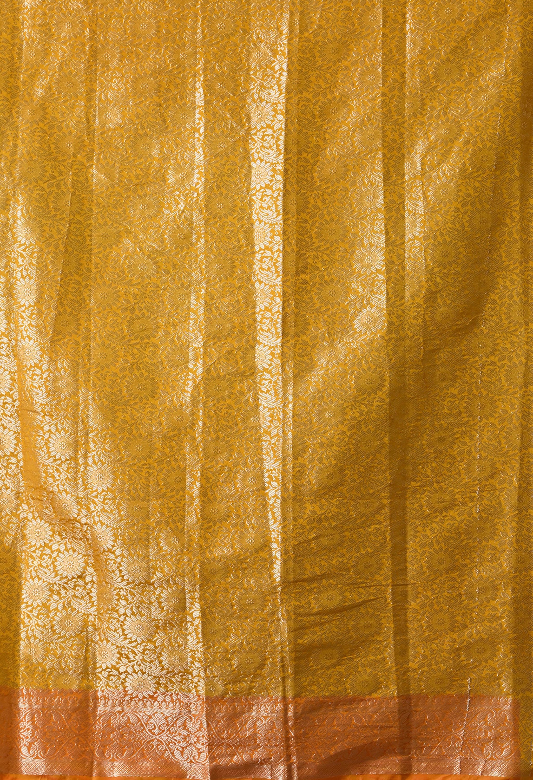 An 80 cm mustard blouse piece with zari work and orange border 